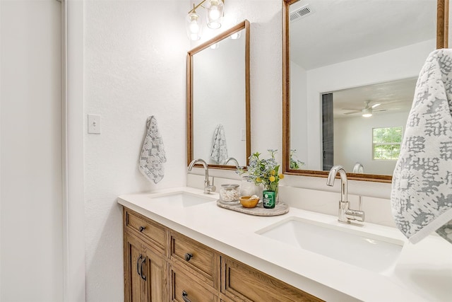 bathroom with vanity and ceiling fan