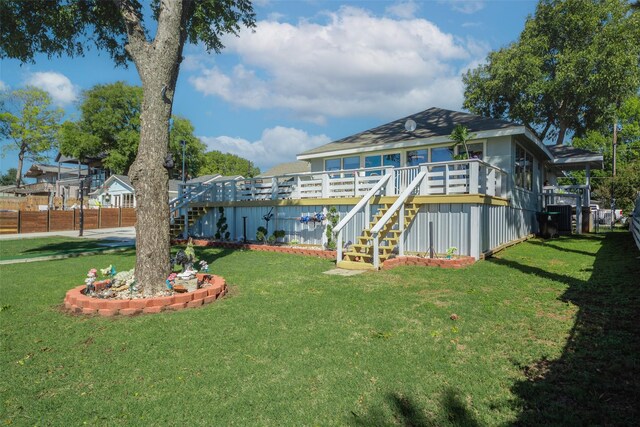 view of yard featuring a deck