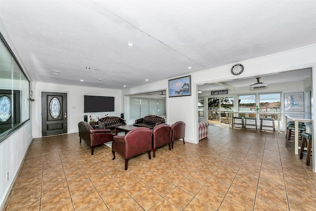 tiled living room with a textured ceiling