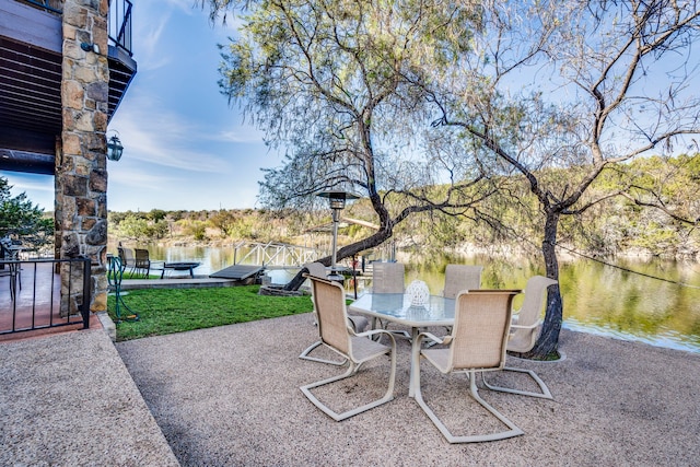 1133 Brackeen Dr, Graford, TX 76449 - view of patio / terrace with a water view and outdoor dining space