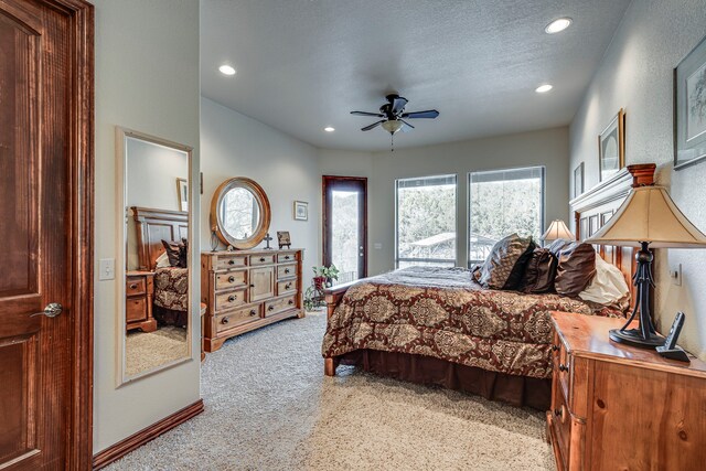 1133 Brackeen Dr, Graford, TX 76449 - bedroom featuring access to outside, light colored carpet, recessed lighting, a ceiling fan, and baseboards