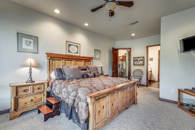 1133 Brackeen Dr, Graford, TX 76449 - bedroom with light colored carpet, recessed lighting, ensuite bathroom, baseboards, and ceiling fan
