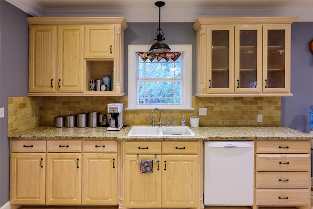 kitchen with light brown cabinetry, sink, decorative backsplash, and dishwasher