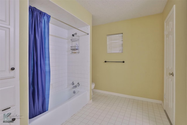 bathroom featuring shower / bath combination with curtain, a textured ceiling, and toilet