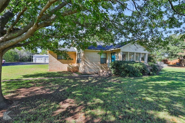 view of front of property with a front yard