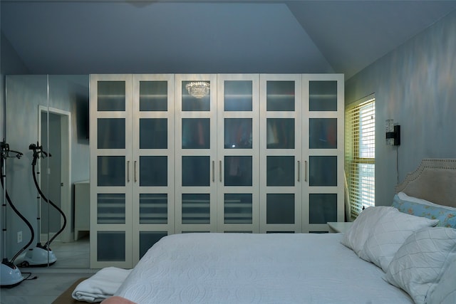 bedroom with vaulted ceiling