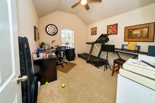 carpeted office space with ceiling fan and lofted ceiling