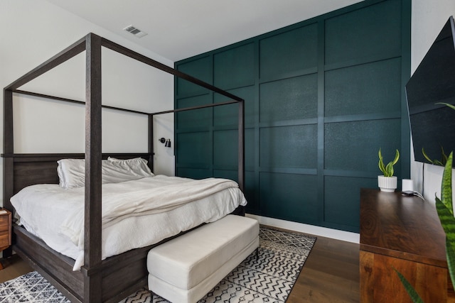 bedroom featuring hardwood / wood-style floors