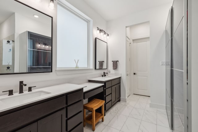 bathroom featuring a shower and vanity