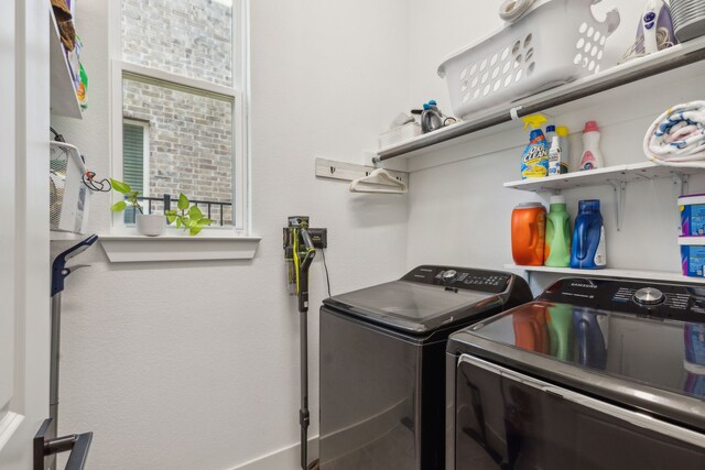 washroom featuring separate washer and dryer