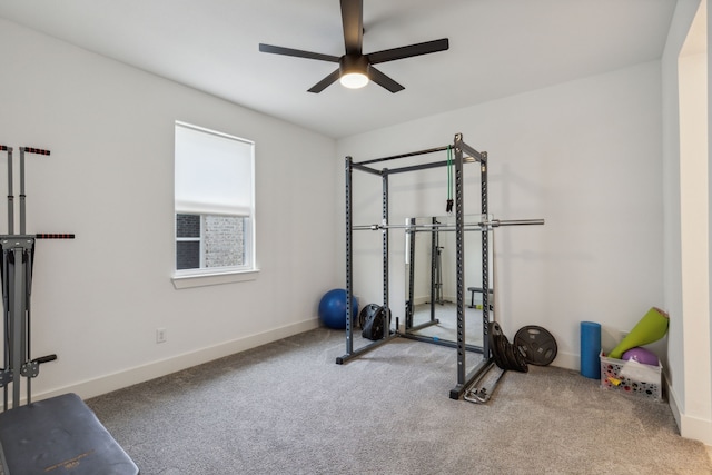 exercise area featuring carpet and ceiling fan