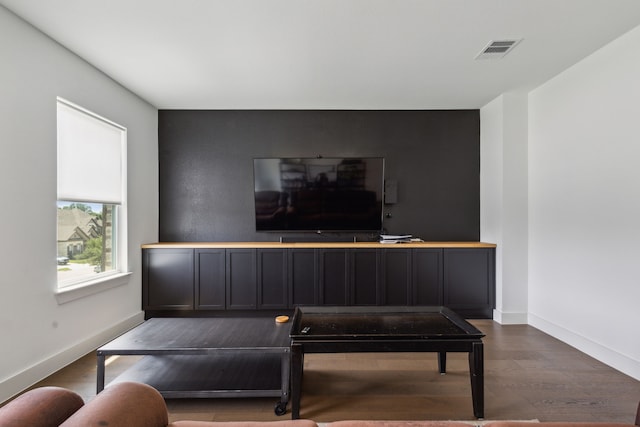 living room with dark wood-type flooring