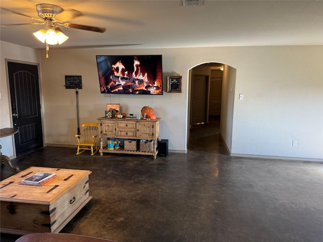 living room featuring ceiling fan