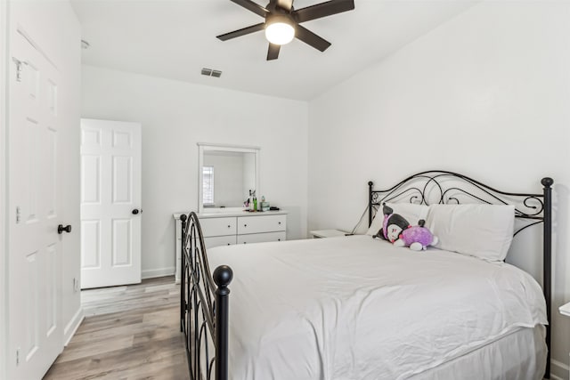 bedroom featuring ceiling fan and light hardwood / wood-style floors