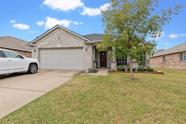 view of front facade with a garage and a front yard