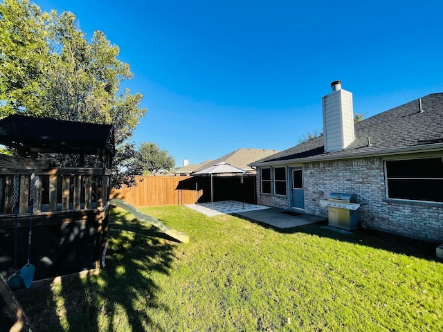 view of yard with a patio area