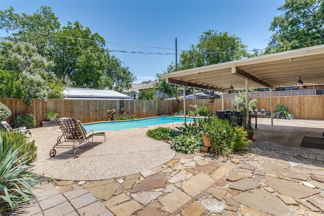 view of swimming pool featuring a patio