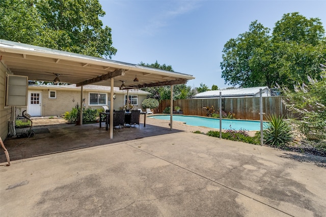 view of pool featuring a patio area and ceiling fan