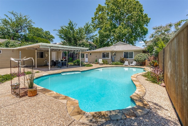 view of pool featuring a patio area