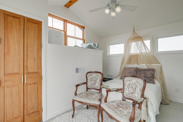 sitting room with lofted ceiling with beams, carpet floors, and ceiling fan