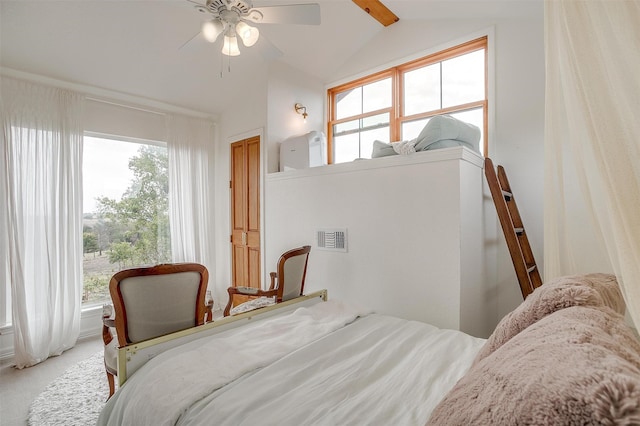 bedroom with ceiling fan, multiple windows, and vaulted ceiling with beams