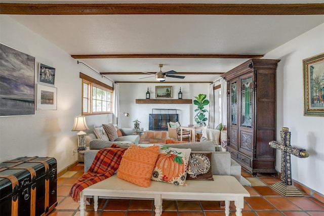 tiled living room featuring ceiling fan and beam ceiling