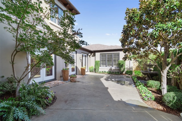 exterior space with french doors and a patio