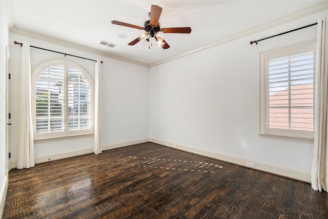 unfurnished room with dark hardwood / wood-style flooring, ceiling fan, and crown molding