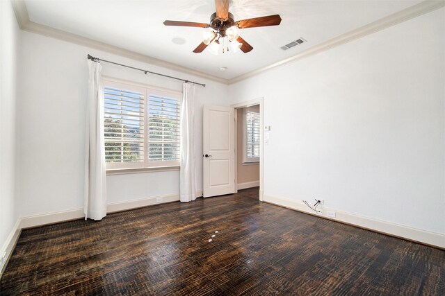 spare room featuring ceiling fan, dark hardwood / wood-style flooring, and ornamental molding