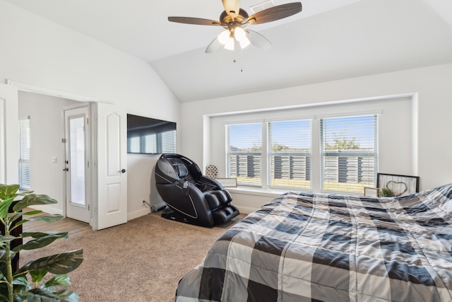 carpeted bedroom featuring ceiling fan and lofted ceiling