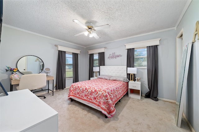 bedroom featuring ornamental molding, a textured ceiling, light colored carpet, and ceiling fan