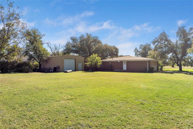 view of yard featuring a garage