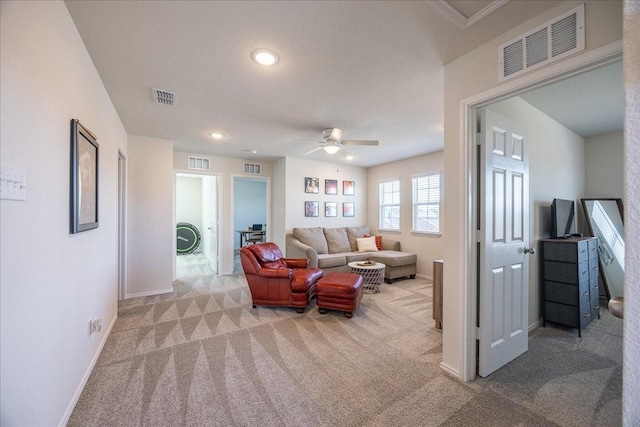 living room with carpet flooring, baseboards, ceiling fan, and recessed lighting