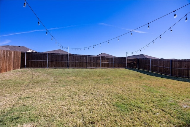 view of yard featuring a fenced backyard