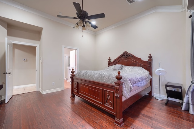 bedroom featuring ornamental molding, ceiling fan, and dark hardwood / wood-style floors