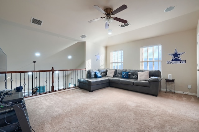 carpeted living room featuring a water view, lofted ceiling, and ceiling fan