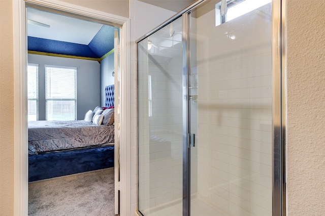 bathroom with walk in shower and a textured ceiling