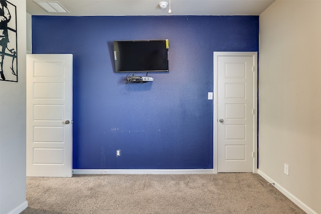 unfurnished bedroom featuring carpet floors