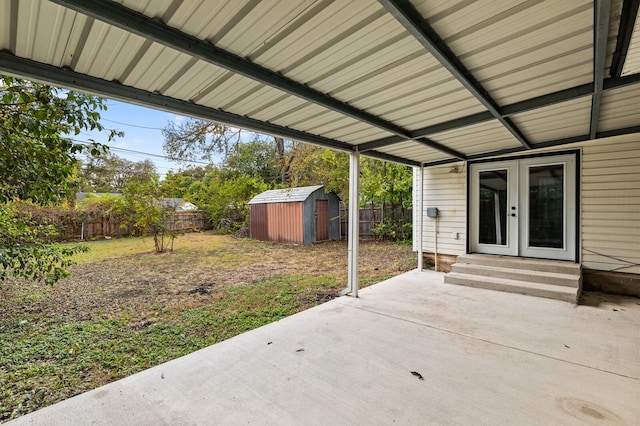 view of patio / terrace featuring a storage unit and french doors