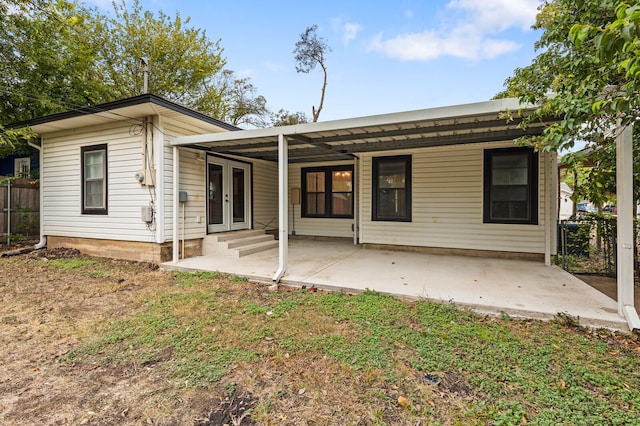 back of house with french doors