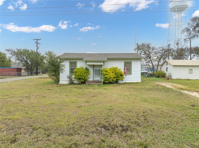 ranch-style house with a front yard