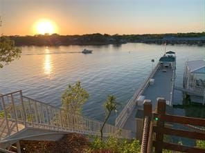 dock area featuring a water view