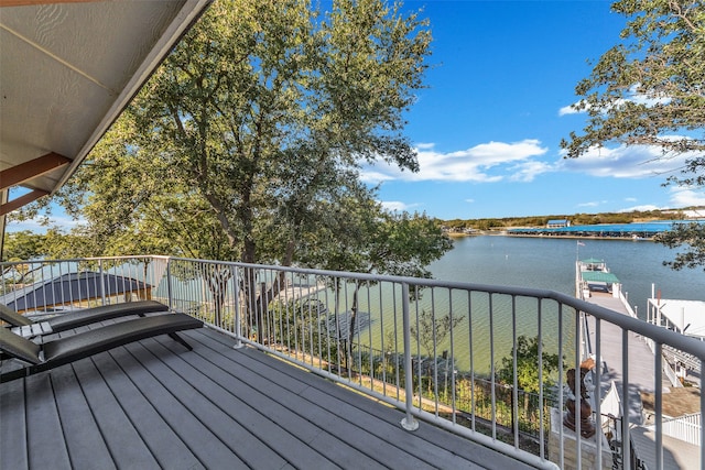 deck featuring a water view