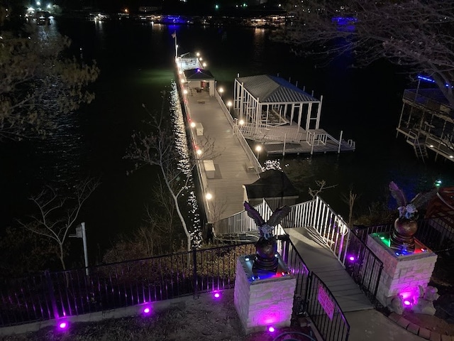 aerial view at twilight with a water view