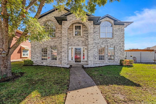 view of front of home with a front yard