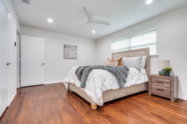 bedroom featuring dark wood-type flooring and ceiling fan