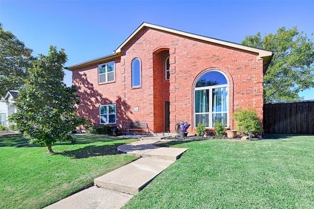 view of front of house with a front lawn