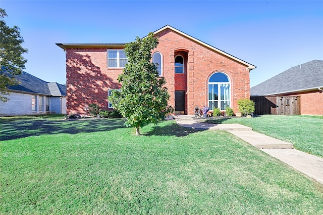 view of front of home featuring a front lawn