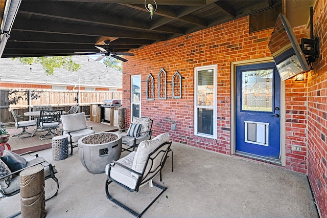 view of patio featuring ceiling fan