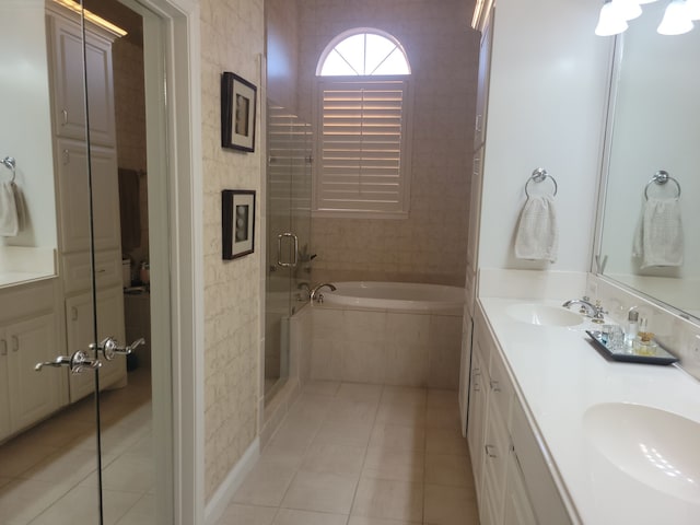 bathroom featuring tile patterned flooring, vanity, and independent shower and bath